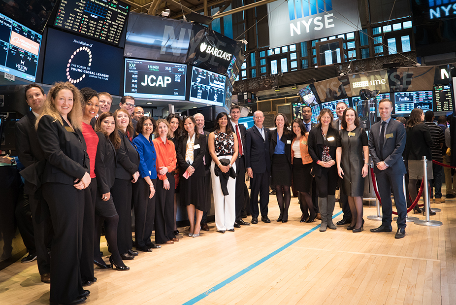Teresa Kay-Aba Kennedy with fellow Young Global Leaders and World Economic Forum Members at Opening Bell Ceremony of New York Stock Exchange - March 27, 2015