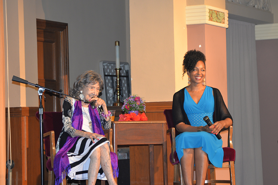 97-year-old yoga master Tao Porchon-Lynch and empowerment expert Teresa Kay-Aba Kennedy in "Conversation with a Master" in Kansas City