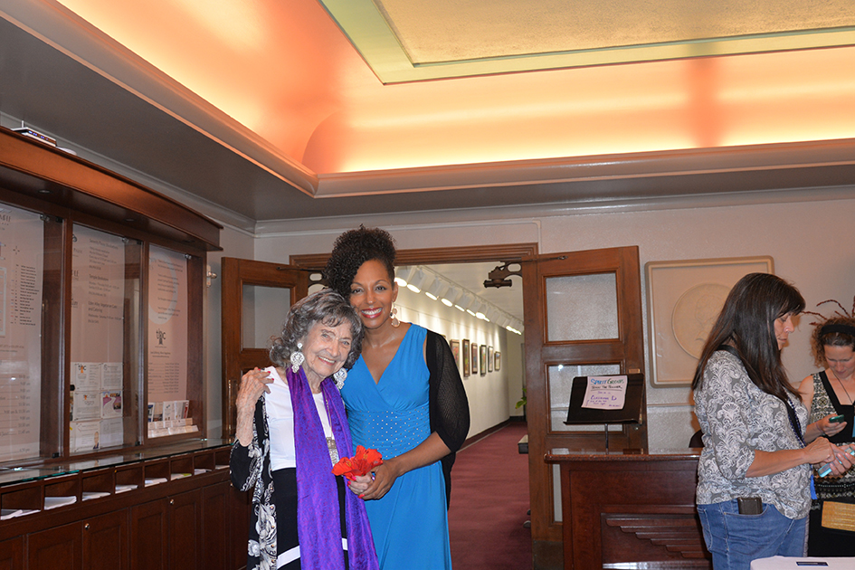 97-year-old yoga master Tao Porchon-Lynch and empowerment expert Teresa Kay-Aba Kennedy in Kansas City
