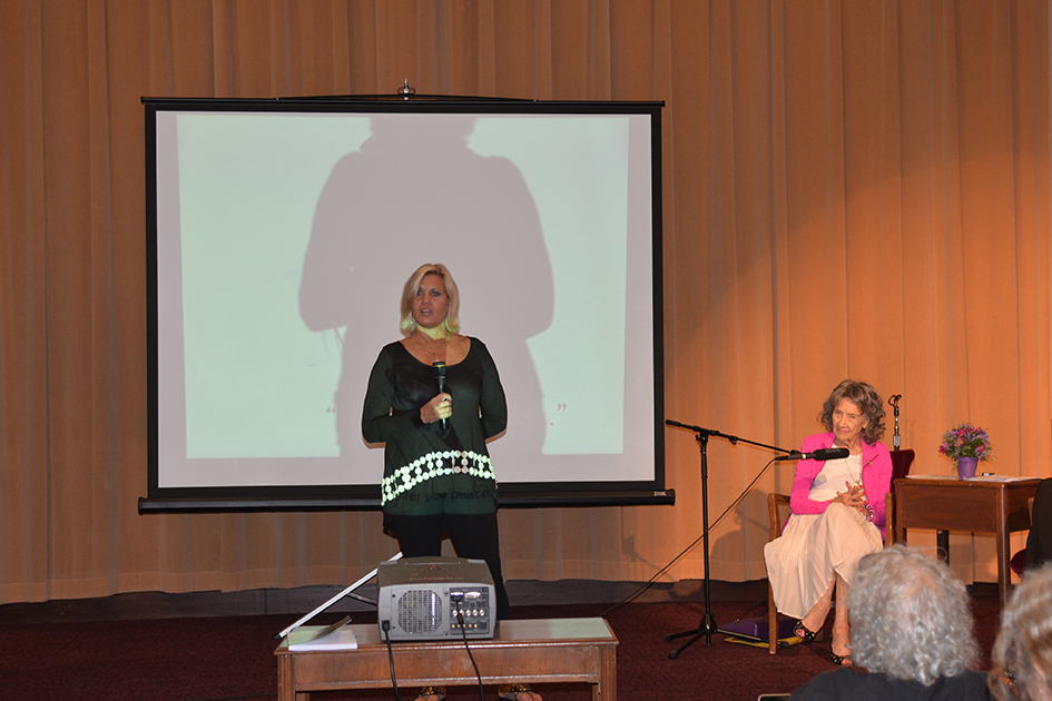 Gretchen Robinson introducing 97-year-old yoga master Tao Porchon-Lynch and empowerment expert Teresa Kay-Aba Kennedy for The Gandhi Effect workshop in Kansas City