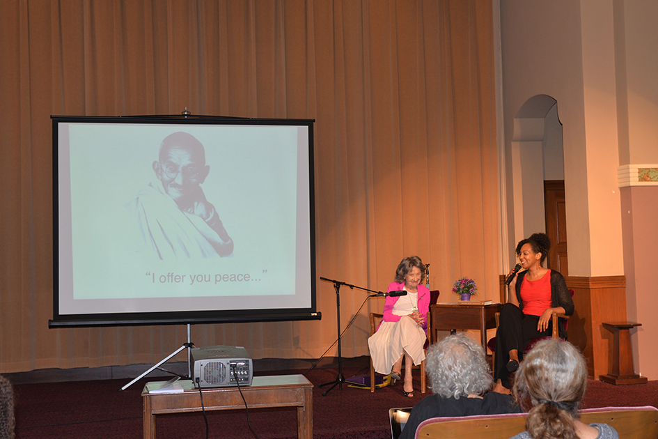 97-year-old yoga master Tao Porchon-Lynch and empowerment expert Teresa Kay-Aba Kennedy leading The Gandhi Effect workshop in Kansas City