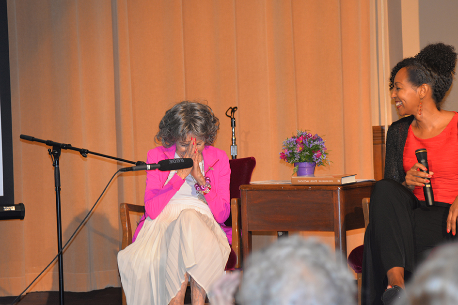 97-year-old yoga master Tao Porchon-Lynch and empowerment expert Teresa Kay-Aba Kennedy leading The Gandhi Effect workshop in Kansas City
