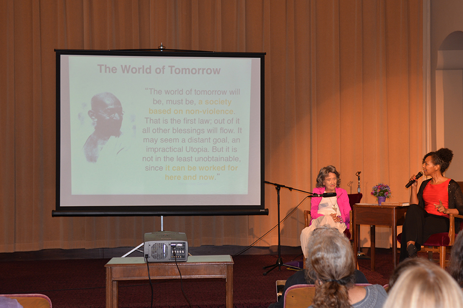 97-year-old yoga master Tao Porchon-Lynch and empowerment expert Teresa Kay-Aba Kennedy leading The Gandhi Effect workshop in Kansas City