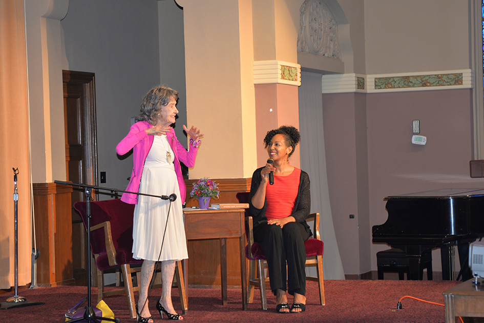 97-year-old yoga master Tao Porchon-Lynch and empowerment expert Teresa Kay-Aba Kennedy leading The Gandhi Effect workshop in Kansas City