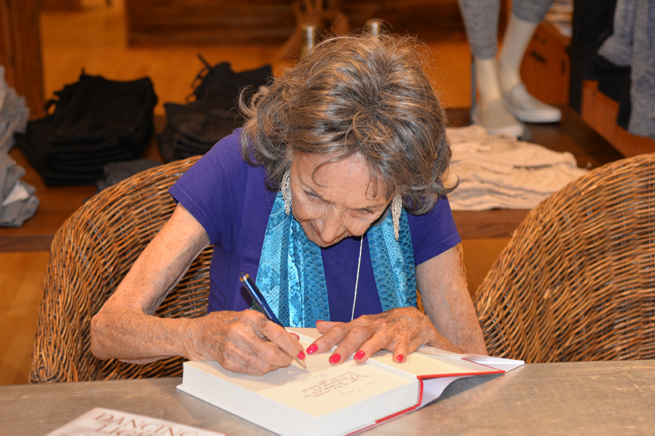 97-year-old yoga master Tao Porchon-Lynch signing her autobiography at Athleta event in Scarsdale, September 17, 2015