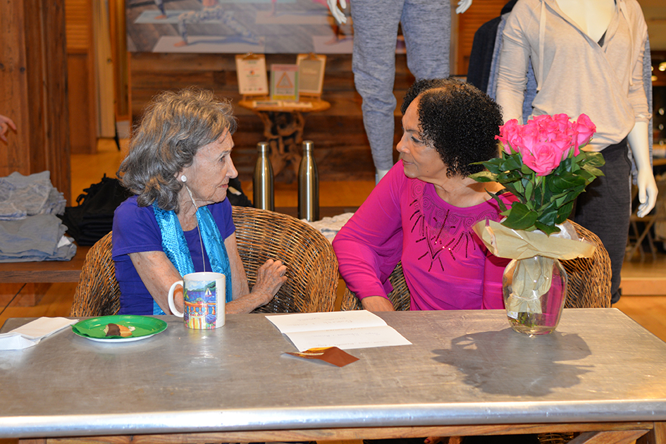 97-year-old yoga master Tao Porchon-Lynch and Janie Sykes-Kennedy at Dancing Light book launch event at Athleta store in Scarsdale, September 17, 2015
