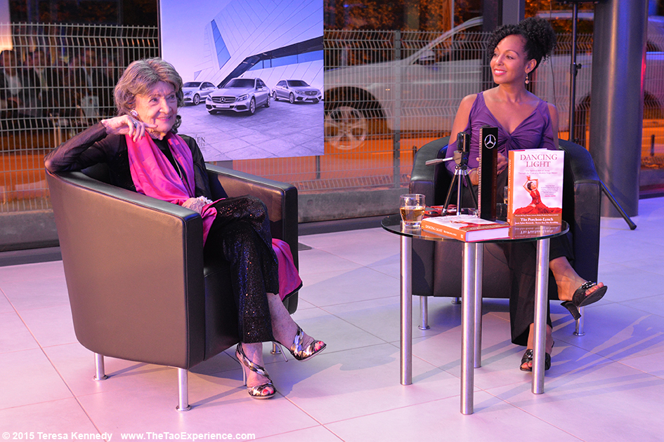 97-year-old yoga master Tao Porchon-Lynch with Teresa Kay-Aba Kennedy presenting at Conversation with a Master event hosted by the Young Executives Society (YES) and Mercedes in Slovenia, October 8, 2015