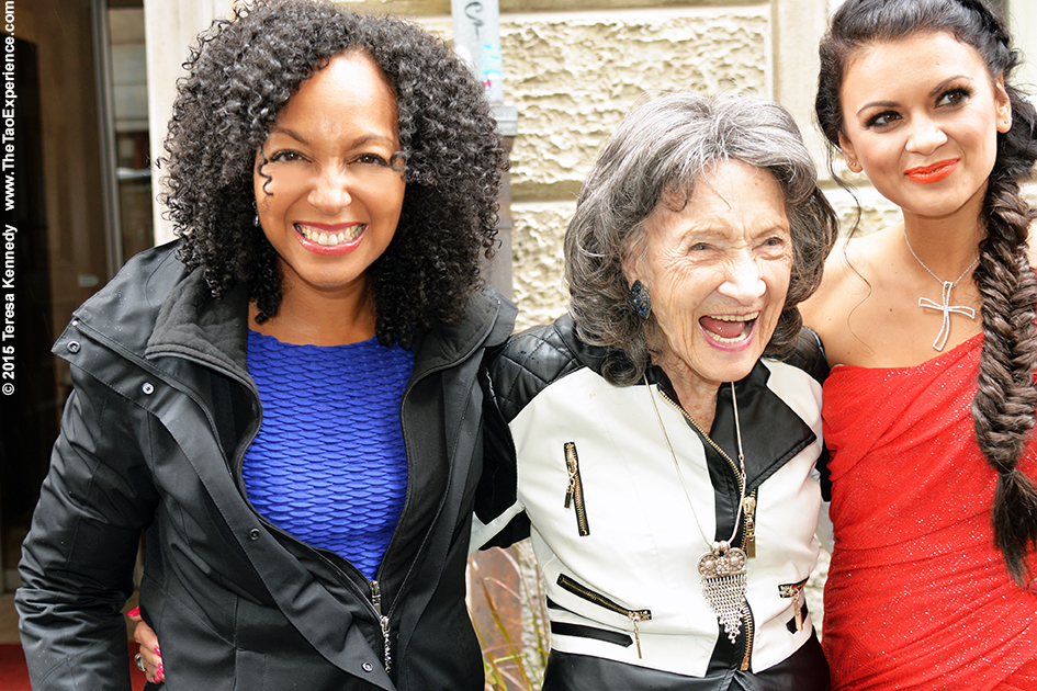 97-year-old yoga master Tao Porchon-Lynch with Teresa Kay-Aba Kennedy and Nina Osenar in Slovenia, October 6, 2015